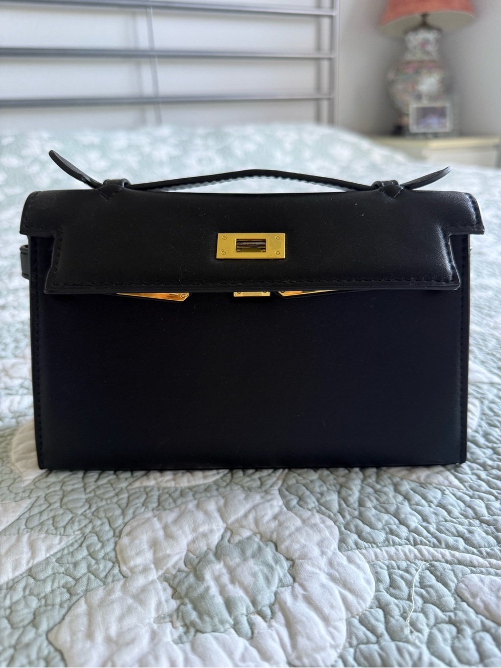 Black Leather Top-Handle Women's Bag with Gold Hardware